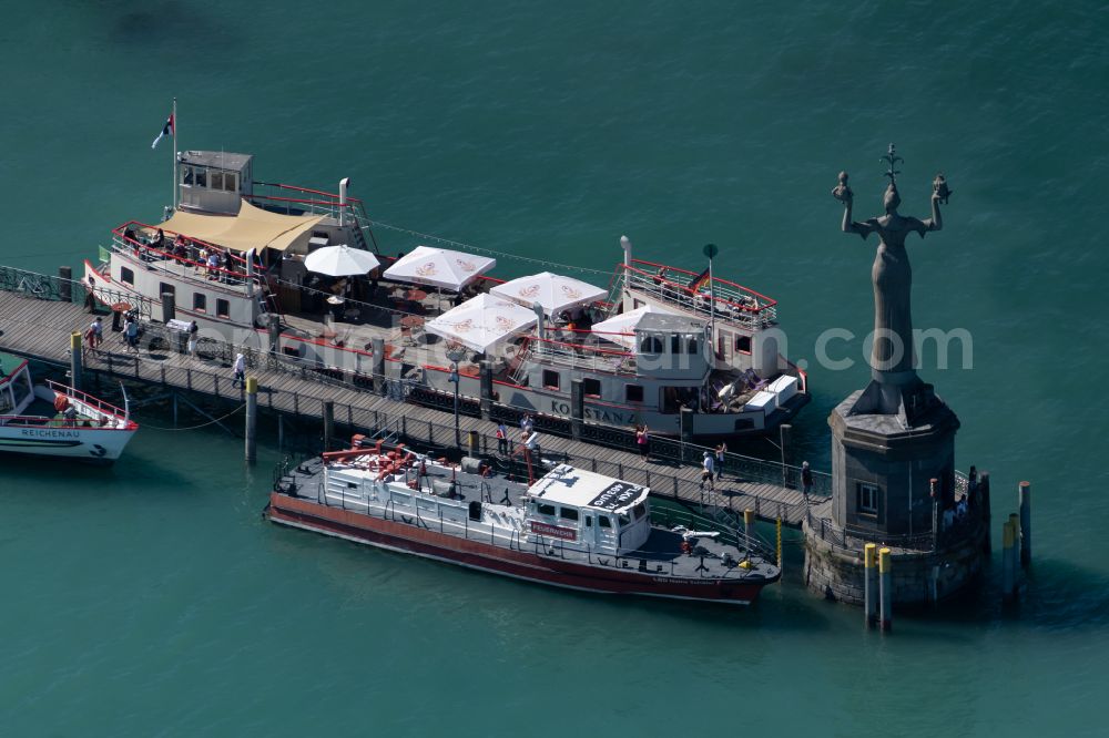 Konstanz from the bird's eye view: Ship moorings at the docks of the inland port for passenger ships and ferries at the Imperia statue on the shore of Lake Constance in the district Altstadt in Konstanz in the state Baden-Wurttemberg, Germany