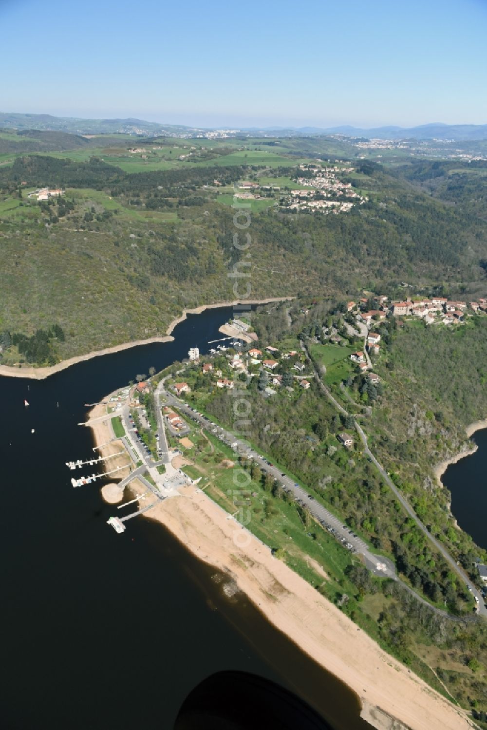 Aerial image Chambles - Impoundment and shore areas at the lake river Loire in Chambles in Auvergne Rhone-Alpes, France