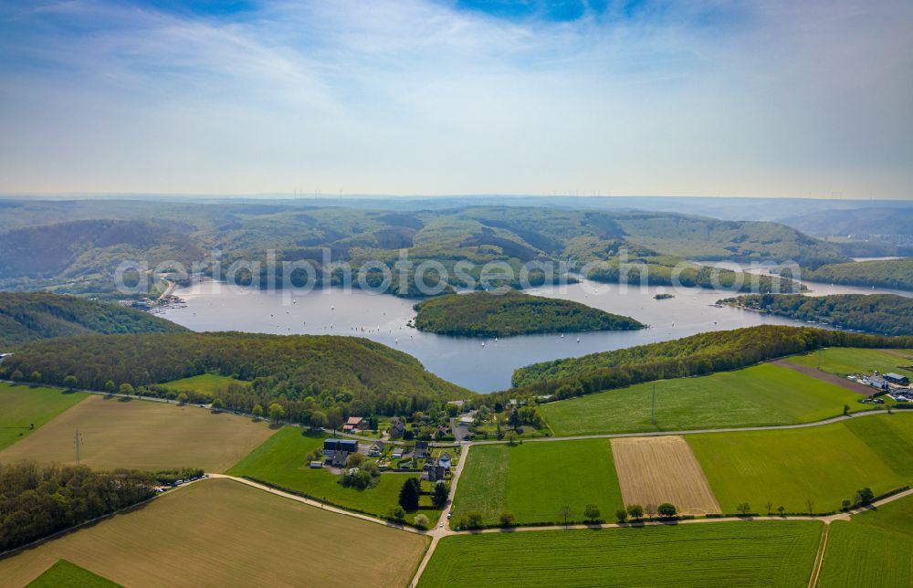 Hastenrath from above - Impoundment and shore areas at the lake Rurtalsperre Schwammenauel in Hastenrath in the state North Rhine-Westphalia, Germany