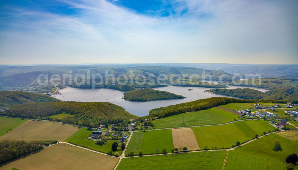 Hastenrath from the bird's eye view: Impoundment and shore areas at the lake Rurtalsperre Schwammenauel in Hastenrath in the state North Rhine-Westphalia, Germany