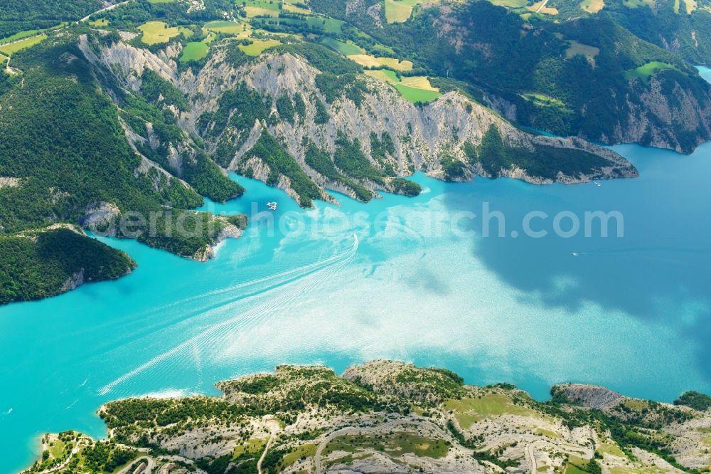 Chorges from above - Impoundment and shore areas with habor at the lake Lac de Serre-Poncon in Chorges in Provence-Alpes-Cote d'Azur, France