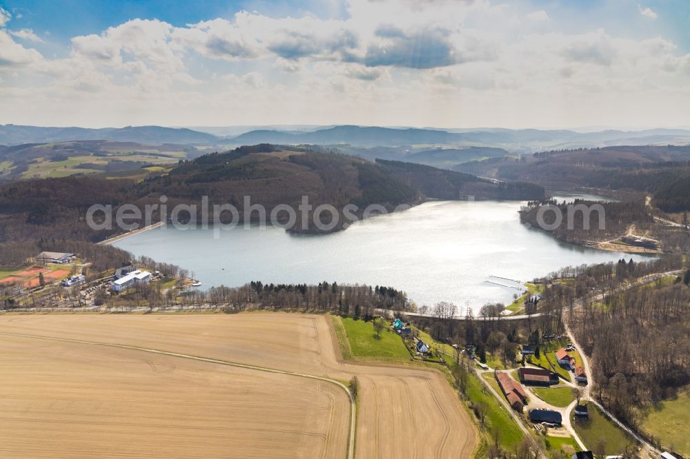 Aerial image Meschede - Impoundment and shore areas at the lake Hennesee in Meschede in the state North Rhine-Westphalia, Germany