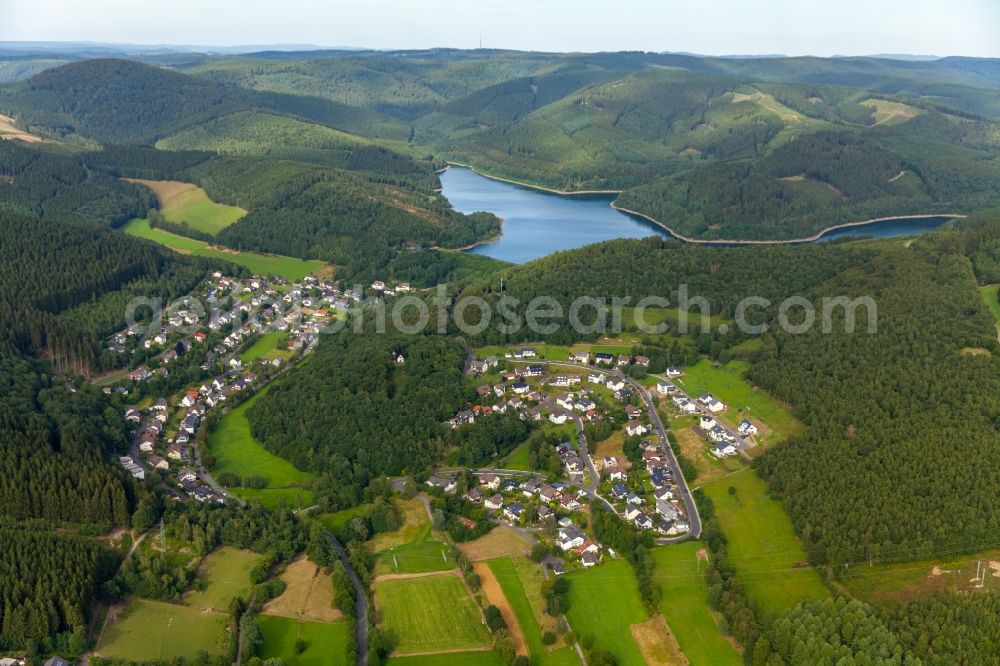 Netphen from above - Impoundment and shore areas at the lake Obernautalsperre - Obernau Stausee in Netphen in the state North Rhine-Westphalia. The Brauersdorf part of Netphen is located in the foreground