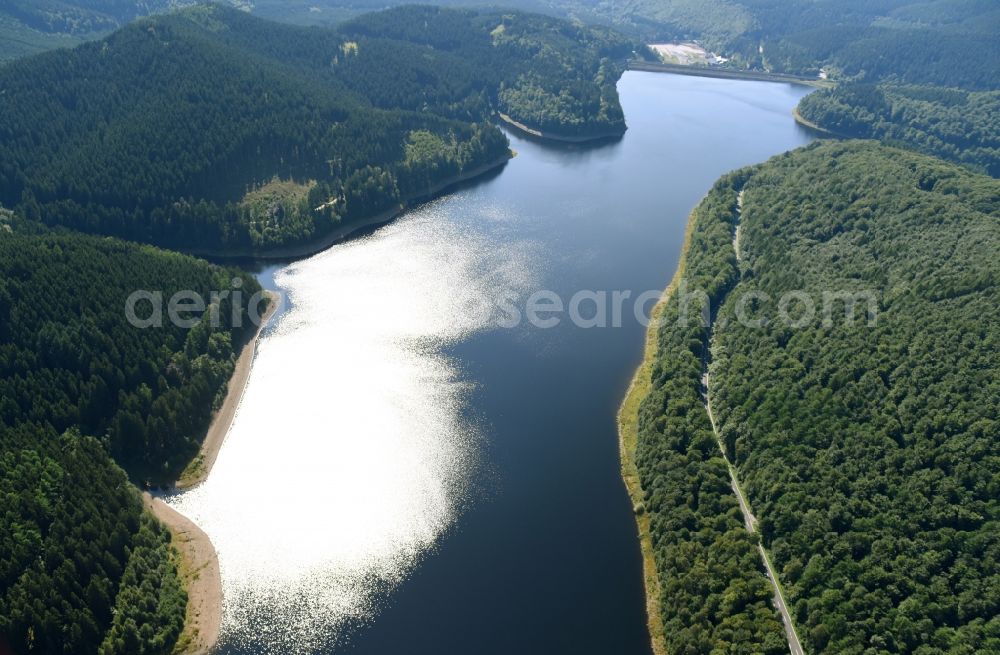 Osterode am Harz from the bird's eye view: Impoundment and shore areas at the lake Soesestausee in Osterode am Harz in the state Lower Saxony, Germany