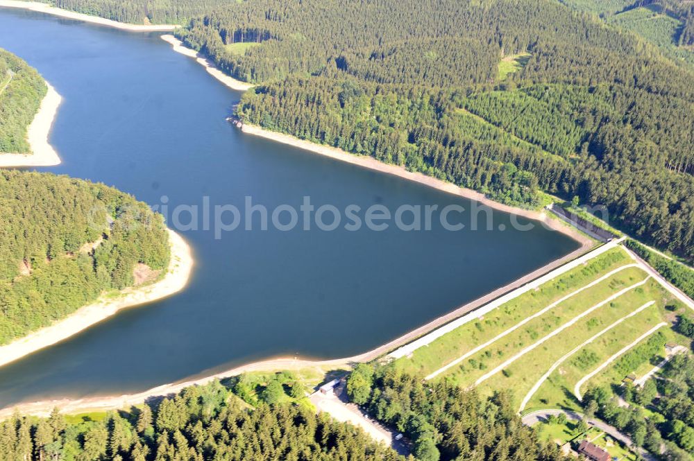 Osterrode from the bird's eye view: View of the reservoir and dam in the Sösetalsperre, a dam at Osterode in Lower Saxony. It was the first dam of Harzwasserwerke built from 1928 to 1931 at the Söse and serves the drinking water supply, flood protection, the low water and electricity. Operator of the system are the Harzwasserwerke