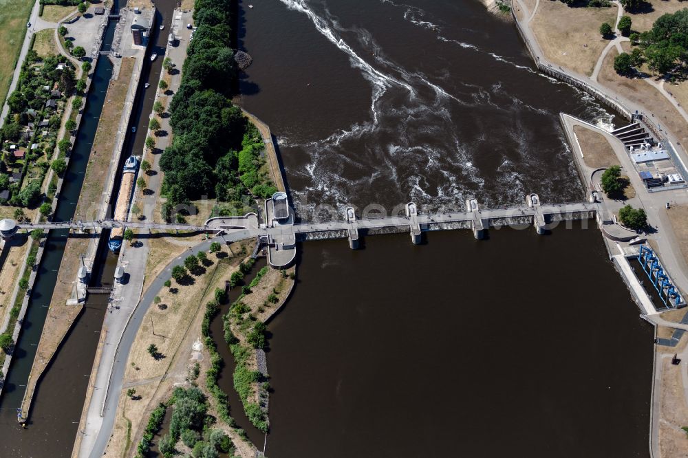 Bremen from above - Weir on the banks of the flux flow Weser in Bremen in Germany