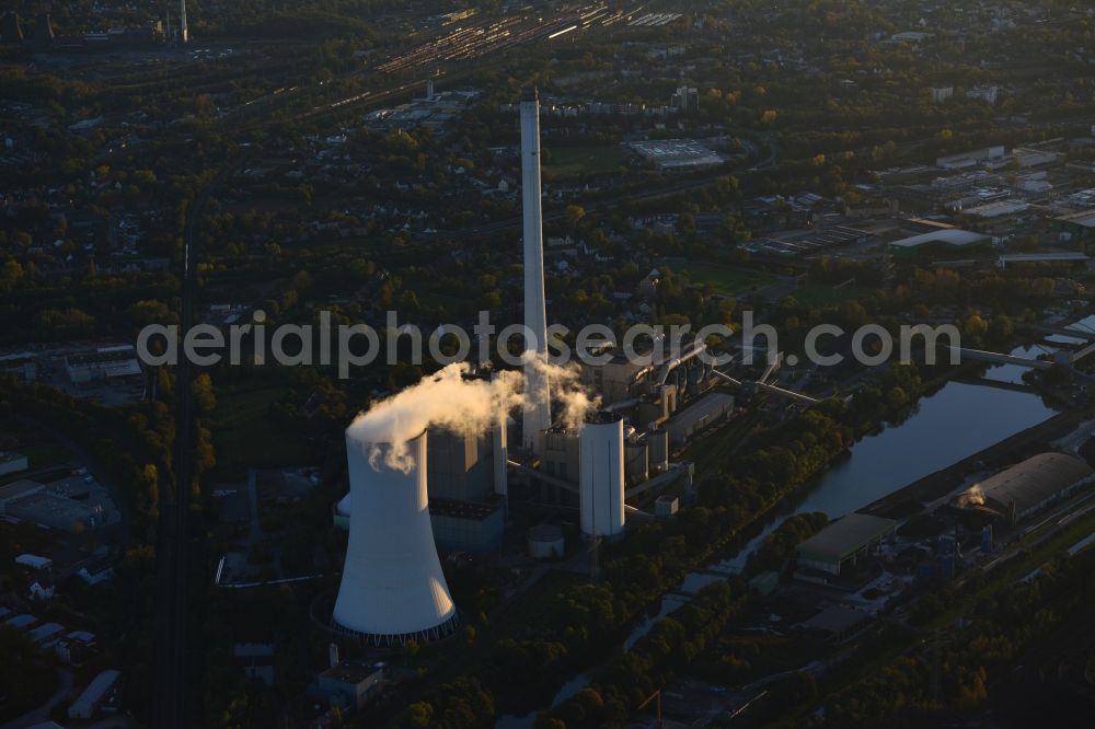 Aerial photograph Herne - Steag CHP group power plant in sunset-evening light on the Rhine-Herne Canal Herne in the state of North Rhine-Westphalia