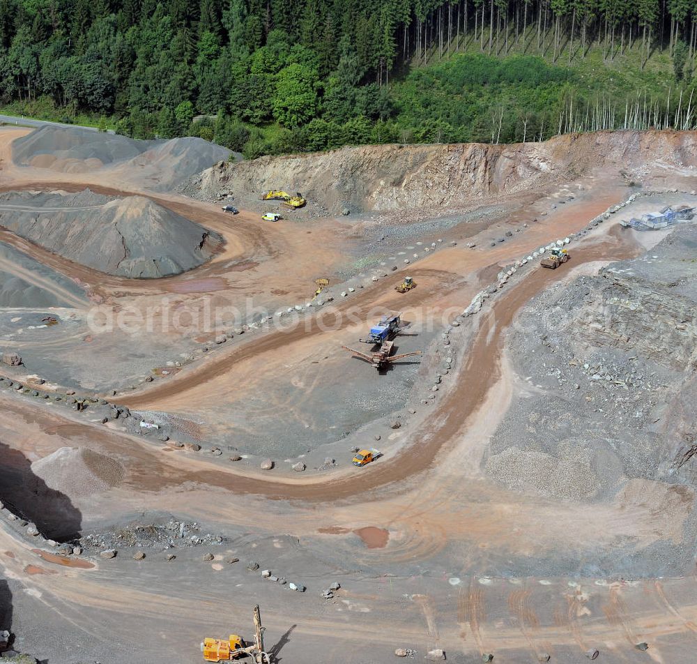 Aerial image Tabarz - Der Steinbruch der Hartsteinwerk Tabarz Fritz Neuland GmbH & Co. Natursteinvertrieb KG am Inselberg. The quarry of Hartsteinwerk Tabarz Fritz Neuland GmbH & Co. KG Natursteinvertrieb on the Inselberg.