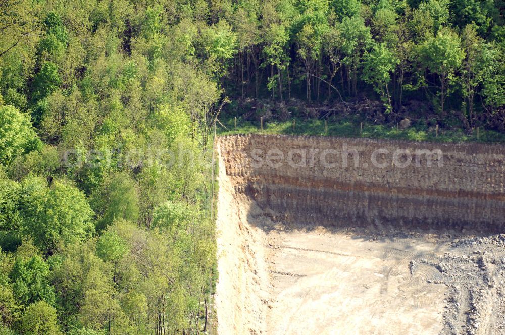 Aerial photograph Gundelsheim - Steinbruch der Gundelsheimer Marmorwerke. Der großflächige Steinbruch wird ständig erweitert und z. B. für Bodenplatten oder auch Fenstersimse in Innenbereichen abgebaut. Kontakt: Gundelsheimer Marmorwerk GmbH & Co KG, Solnhofer Bruch 9, 91807 Solnhofen, Tel.: +49(0)9145 601 400, Fax: +49(0)9145 601 444, Achim Walder: