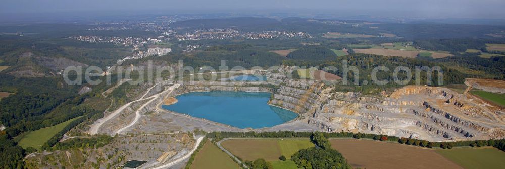 Aerial photograph Asbeck - Blick auf den Steinbruch Horst mit Klärbecken bei Asbeck. Hier wird Kalk abgebaut. View of the quarry Horst with sedimentation tank near Asbeck.