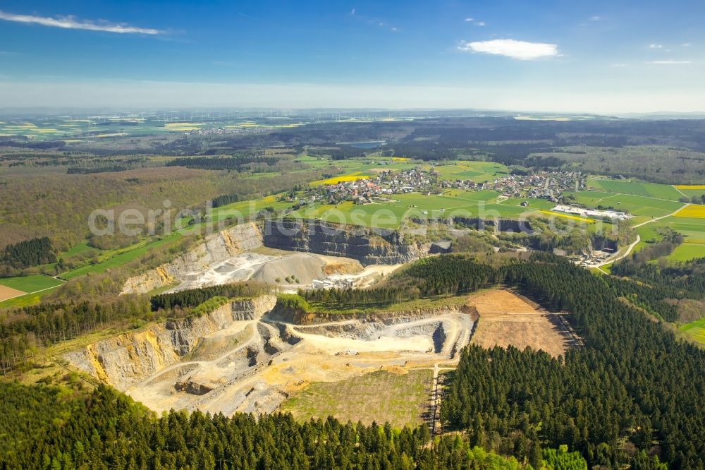 Bad Wünnenberg from the bird's eye view: Quarry of Sauerlaender Hartkalkstein-Industrie GmbH on Am Steinbruch in Bad Wuennenberg in the state North Rhine-Westphalia, Germany