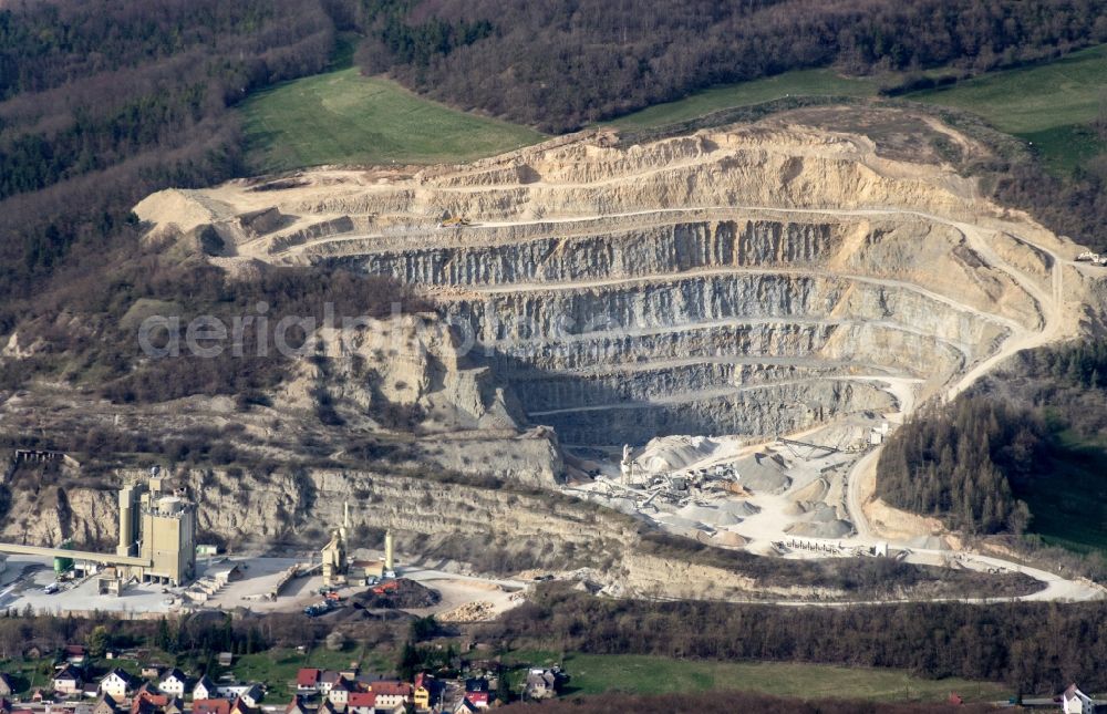 Steudnitz from the bird's eye view: The Thomas Gruppe in Dorndorf-steudnitz in Germany operates a cement plant with limestone quarry, in which limestone rocks are obtained for cement and building materials production