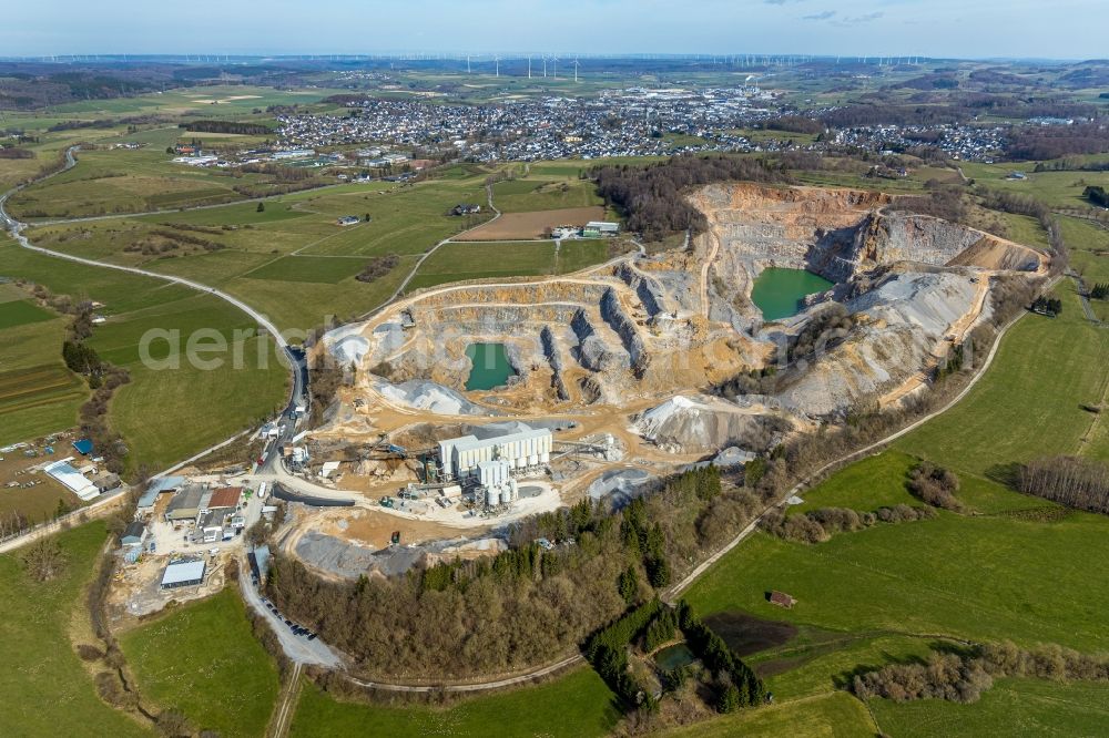 Brilon from above - Quarry for the mining and handling of granite in Brilon in the state North Rhine-Westphalia, Germany