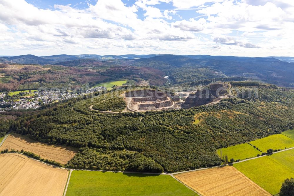 Aerial photograph Brilon - Quarry for the mining and handling of Grauwacke of Westdeutschen Grauwacke Union GmbH in Brilon in the state North Rhine-Westphalia, Germany