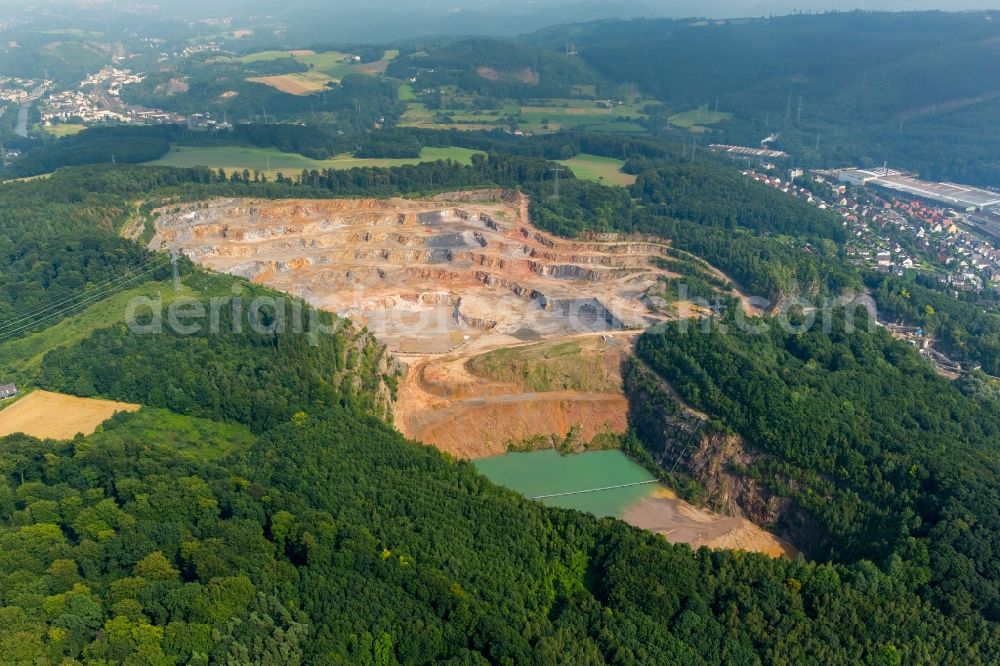 Hagen from the bird's eye view: Quarry to mining limestone of the Hohenlimburger Kalkwerke GmbH in Hagen in the state North Rhine-Westphalia