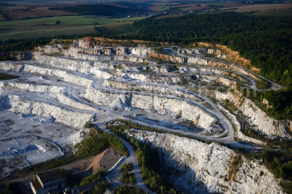 Niedersachswerfen from the bird's eye view: Quarry for the mining and handling of calcareous sandstone in Niedersachswerfen in the state Thuringia, Germany