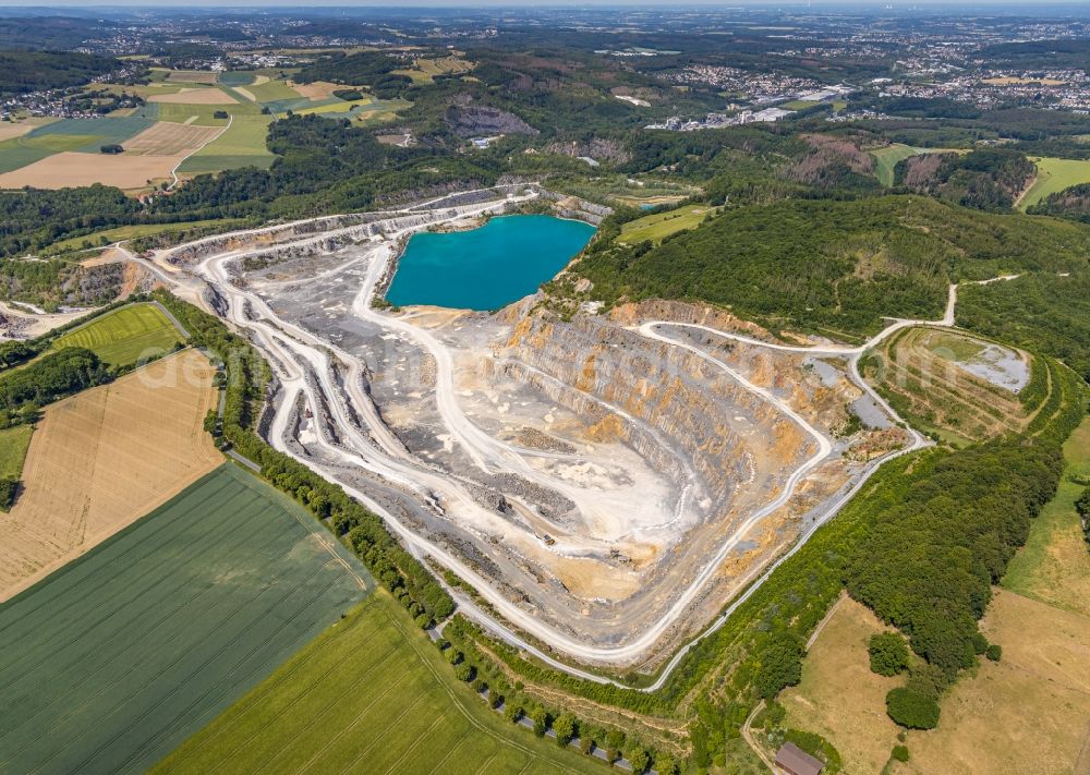 Eisborn from the bird's eye view: Quarry for the mining and handling of limestone in Eisborn in the state North Rhine-Westphalia, Germany