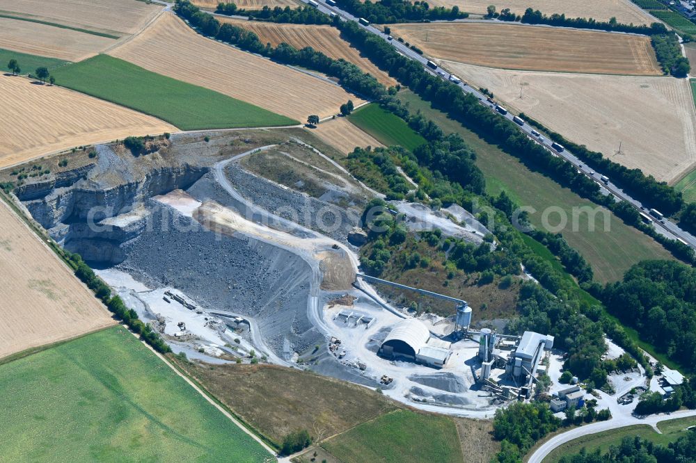 Bretzfeld from the bird's eye view: Quarry for the mining and handling of Muschelkalk on street Weisslensburger Strasse in Bretzfeld in the state Baden-Wuerttemberg, Germany