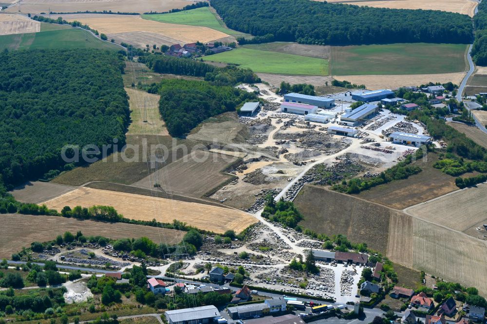 Kleinrinderfeld from the bird's eye view: Quarry for the mining and handling of Muschelkalk on street Maisenbacher Strasse in Kleinrinderfeld in the state Bavaria, Germany