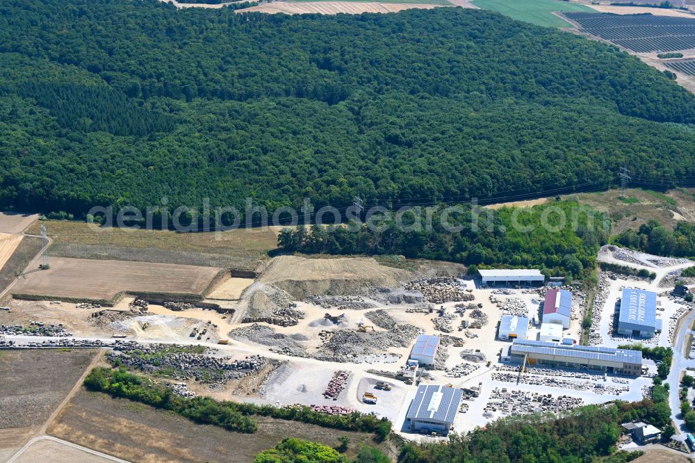 Aerial photograph Kleinrinderfeld - Quarry for the mining and handling of Muschelkalk on street Maisenbacher Strasse in Kleinrinderfeld in the state Bavaria, Germany