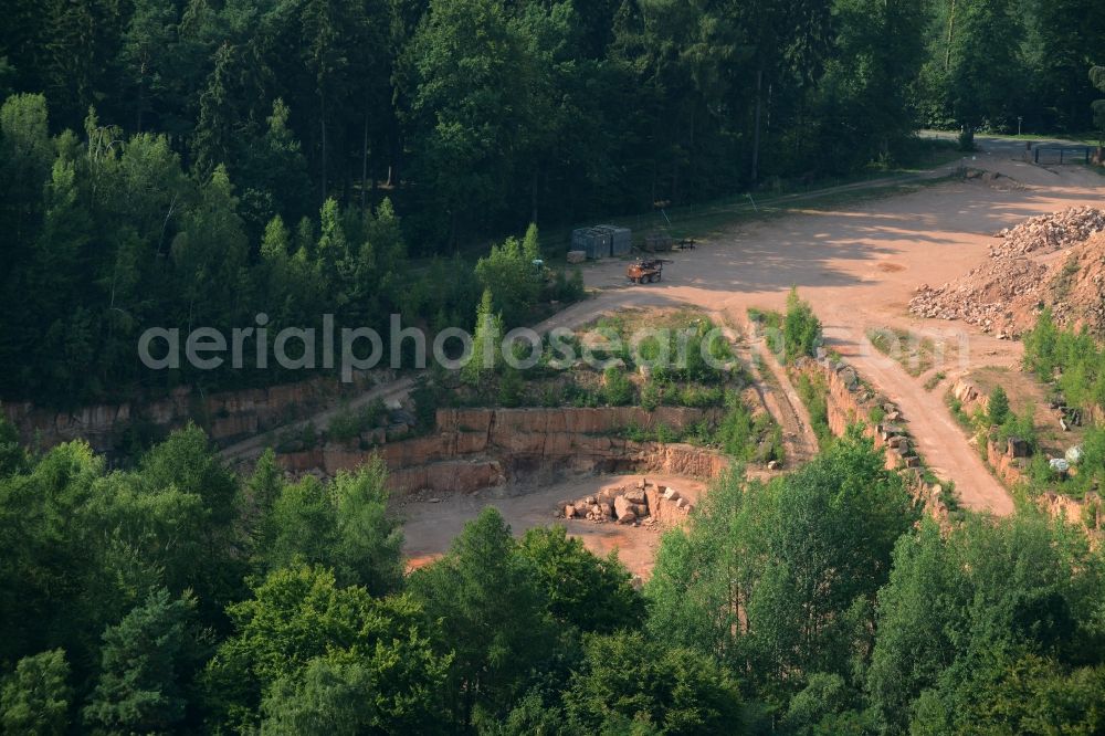 Rochlitz from the bird's eye view: Quarry for mining Rochlitzer Porphyr in Rochlitz in the state of Saxony. Porphyr is a red vulcanic stone on the mountain of Rochlitz