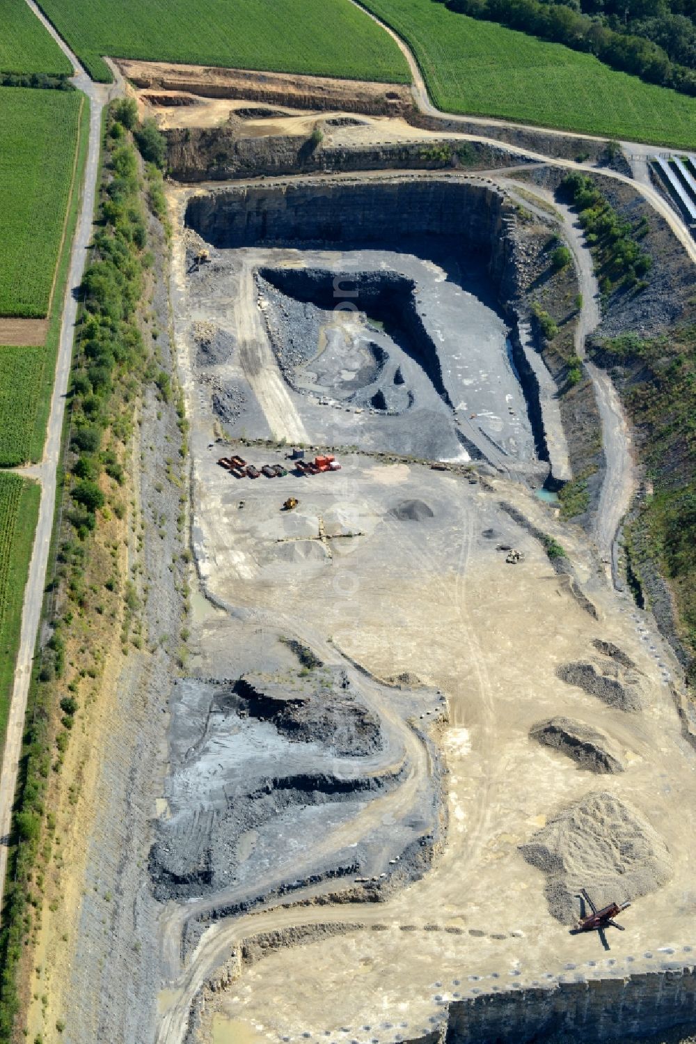 Illingen from the bird's eye view: Quarry for the mining and handling of Schiefer in Illingen in the state Baden-Wuerttemberg