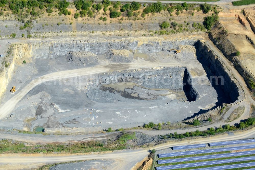 Illingen from the bird's eye view: Quarry for the mining and handling of Schiefer in Illingen in the state Baden-Wuerttemberg