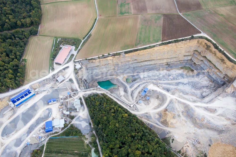 Retzstadt from above - Quarry for the mining and handling of Gravel of Schraud Josef GmbH & Co. KG Schotterwerk in Retzstadt in the state Bavaria, Germany