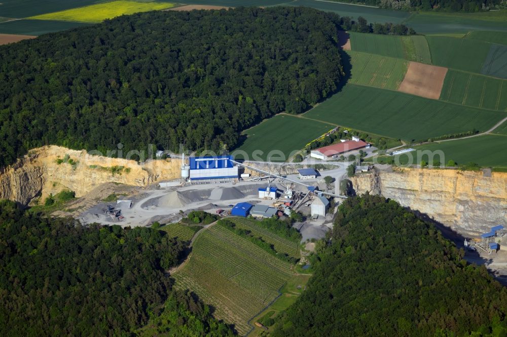 Aerial photograph Retzstadt - Quarry for the mining and handling of Gravel of Schraud Josef GmbH & Co. KG Schotterwerk in Retzstadt in the state Bavaria, Germany