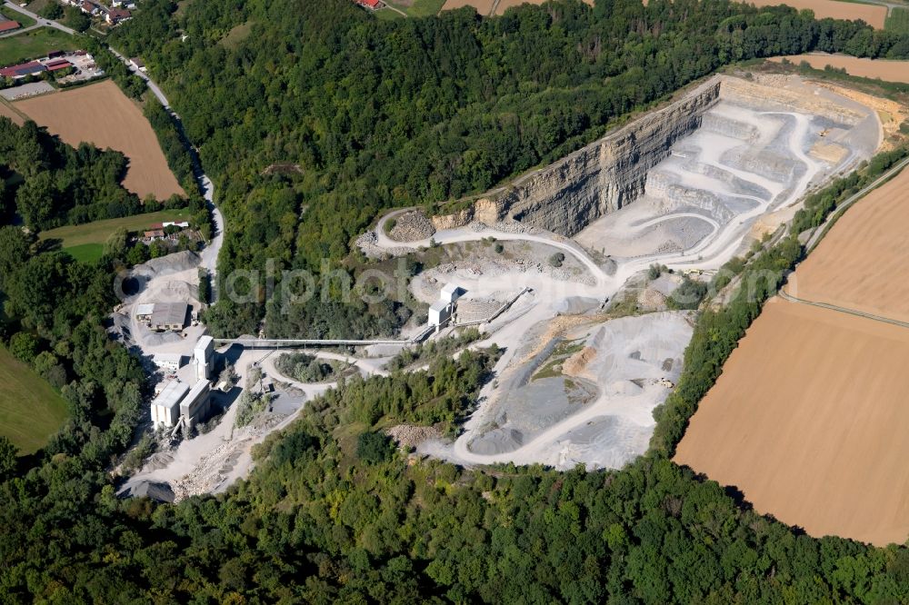 Schöntal from the bird's eye view: Quarry for the mining and handling of gravel, shell limestone, granite in Schoental in the state Baden-Wurttemberg, Germany