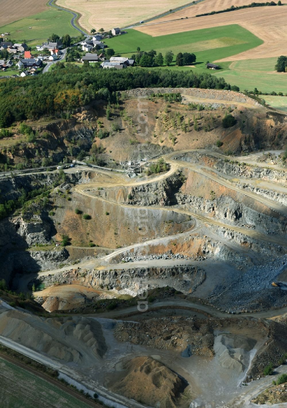 Aerial photograph Reimersgrün - Quarry Diabasbruch Reimersgruen of the company Hartsteinwerke for the mining and handling of bulk good in Reimersgruen in the state Saxon