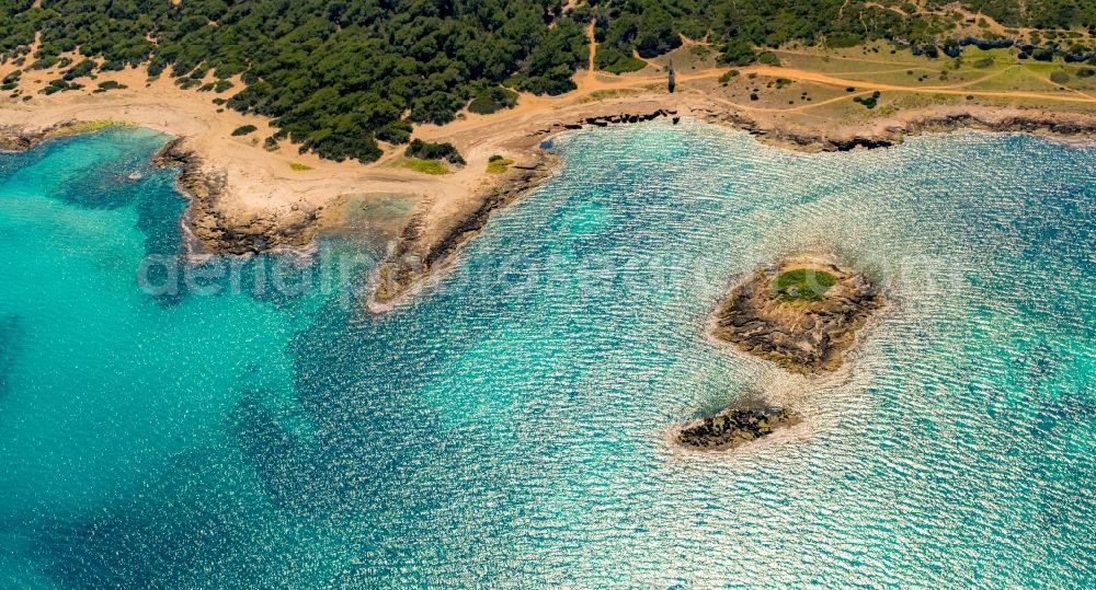 Son Sierra de Marina from the bird's eye view: Stony beach landscape on the coast with Obelisk and tower- remains of Marine in Son Sierra de Marina in Balearic Islands, Spain