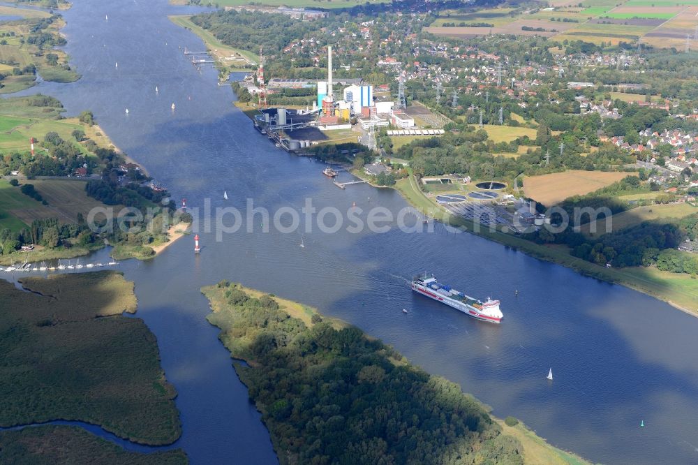 Bremen from above - Coal power plant Farge of the Engie-Group on the riverbank of the Weser in Bremen in Germany. The course of the river is visible as well as a freight ship