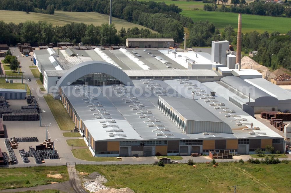 Bad Schmiedeberg from above - Blick auf das Werk der Firma STEINZEUG Abwassersysteme GmbH im Stadtteil Patzschwig. Die STEINZEUG GmbH ist Hersteller von Steinzeugrohren und Formstücken. Weitere Produktionsstandorte sind Frechen in Nordrhein-Westfalen und Hasselt in Belgien. Kontakt: STEINZEUG Abwassersysteme GmbH, Verlängerte Torgauer Straße 1, 06905 Bad Schmiedeberg, Tel. +49(0)2234 5070, Fax +49(0)2234 507730