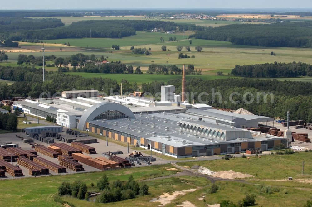 Bad Schmiedeberg from the bird's eye view: Blick auf das Werk der Firma STEINZEUG Abwassersysteme GmbH im Stadtteil Patzschwig. Die STEINZEUG GmbH ist Hersteller von Steinzeugrohren und Formstücken. Weitere Produktionsstandorte sind Frechen in Nordrhein-Westfalen und Hasselt in Belgien. Kontakt: STEINZEUG Abwassersysteme GmbH, Verlängerte Torgauer Straße 1, 06905 Bad Schmiedeberg, Tel. +49(0)2234 5070, Fax +49(0)2234 507730