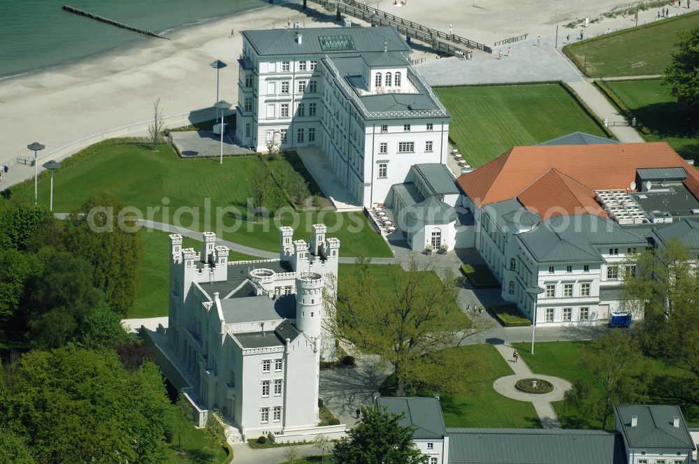 Aerial image Bad Doberan - Heiligendamm - Blick auf die Burg Hohenzollern vom Kempinski Grand Hotel Heiligendamm. Im Hintergrund das Haus Mecklenburg und das Kurhaus. Mit der Burg Hohenzollern hatte einst Großherzog Paul Friedrich sich und seiner Gemahlin einen Traum erfüllt. Heute residiert man unter Zinnen und Giebeln in 12 luxuriösen Doppelzimmer und 9 Suiten. Kontakt: Prof.-Dr.-Vogel-Straße 16-18, 18209 Bad Doberan - Heiligendamm, Tel. +49 (0) 38203 740-0, Fax: +49 (0) 38203 740-7474, E-mail: reservations.heiligendamm@kempinski.com