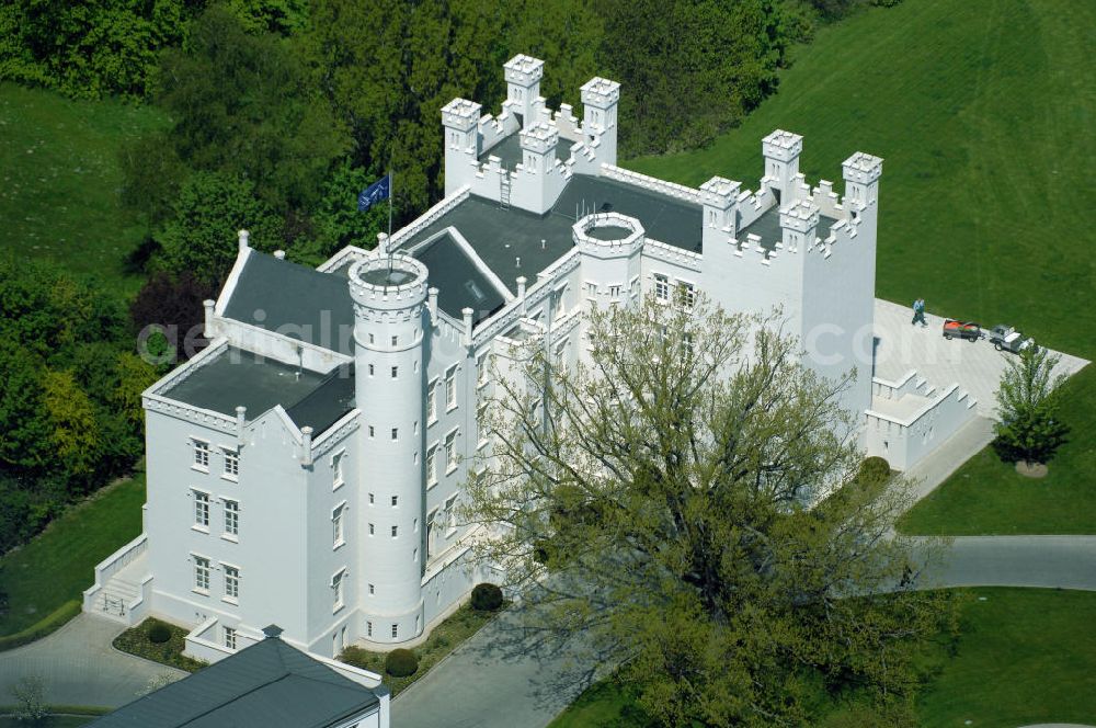 Aerial photograph Bad Doberan - Heiligendamm - Blick auf die Burg Hohenzollern vom Kempinski Grand Hotel Heiligendamm. Mit der Burg Hohenzollern hatte einst Großherzog Paul Friedrich sich und seiner Gemahlin einen Traum erfüllt. Heute residiert man unter Zinnen und Giebeln in 12 luxuriösen Doppelzimmer und 9 Suiten. Kontakt: Prof.-Dr.-Vogel-Straße 16-18, 18209 Bad Doberan - Heiligendamm, Tel. +49 (0) 38203 740-0, Fax: +49 (0) 38203 740-7474, E-mail: reservations.heiligendamm@kempinski.com