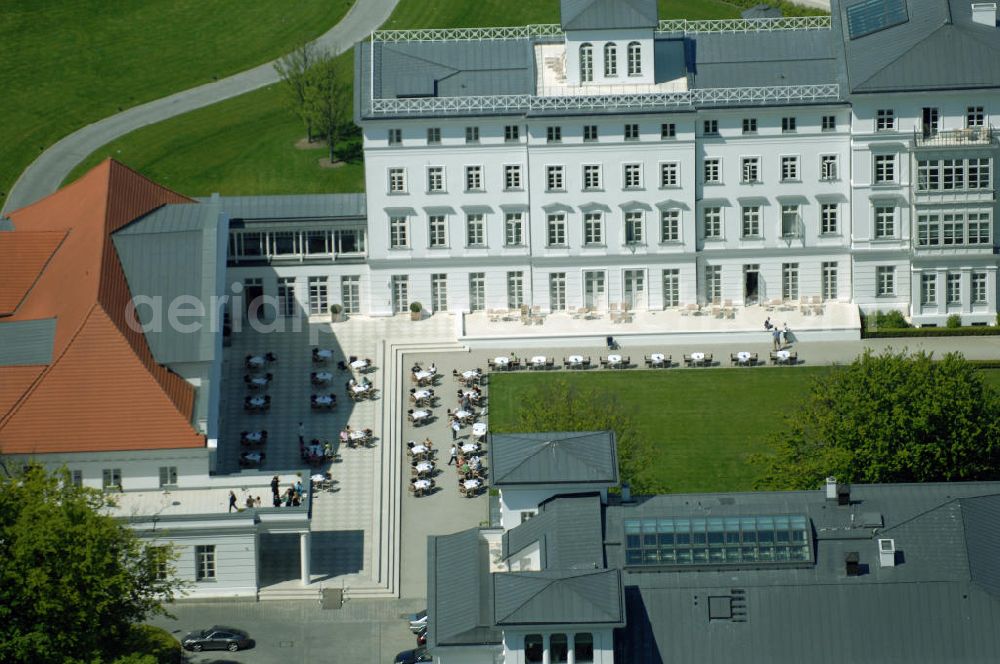 Aerial image Bad Doberan - Heiligendamm - Blick auf die Terasse am Haus Mecklenburg und Kurhaus vom Kempinski Grand Hotel Heiligendamm. Das Haus Mecklenburg umfasst 35 luxuriösen Doppelzimmer und 17 Suiten. Das Haus Mecklenburg erreicht man vom Kurhaus durch einen Wandelgang. Das Kurhaus ist der Mittelpunkt der Hotelanlage mit einem Ballsaal und Restaurant. Kontakt: Prof.-Dr.-Vogel-Straße 16-18, 18209 Bad Doberan - Heiligendamm, Tel. +49 (0) 38203 740-0, Fax: +49 (0) 38203 740-7474, E-mail: reservations.he?????????????????????????