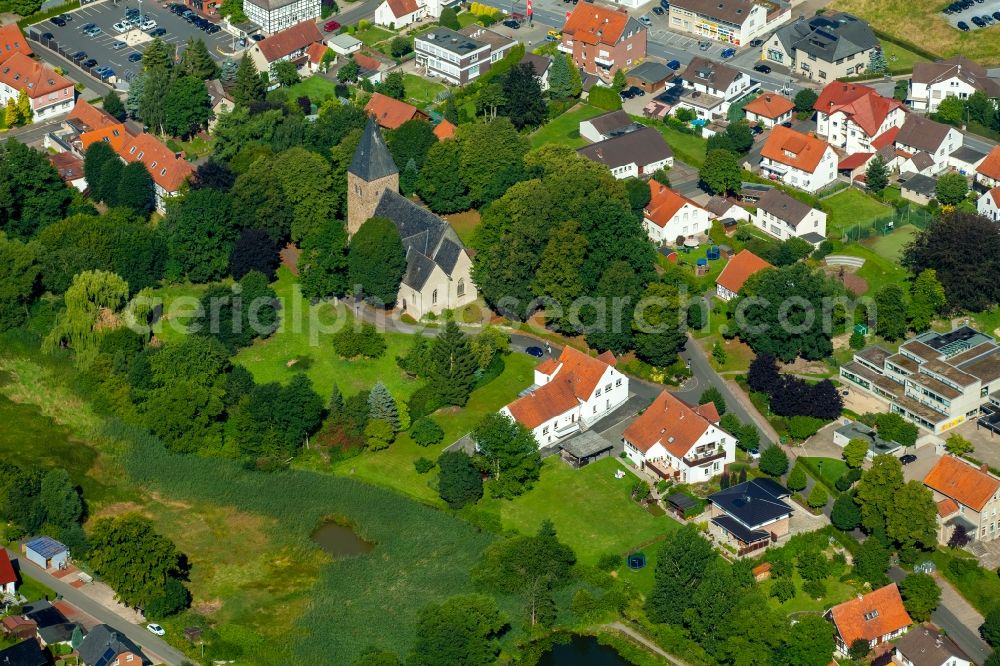 Stift Quernheim from the bird's eye view: Church and view of Stift Quernheim in the state of North Rhine-Westphalia. The village is a part of the borough of Kirchlengern and known for its church