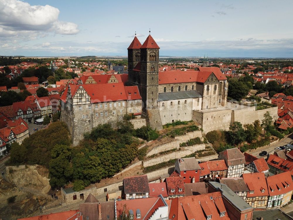 Aerial image Quedlinburg - Collegiate Church St. Servatius and Castle Quedlinburg in Saxony-Anhalt. The place with its 1300 half-timbered houses as well as the castle with the historic church are part of the UNESCO world cultural heritage