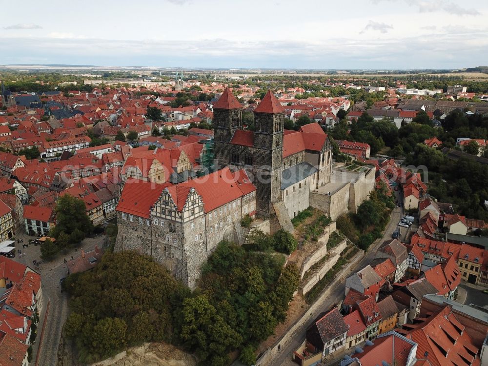 Quedlinburg from above - Collegiate Church St. Servatius and Castle Quedlinburg in Saxony-Anhalt. The place with its 1300 half-timbered houses as well as the castle with the historic church are part of the UNESCO world cultural heritage