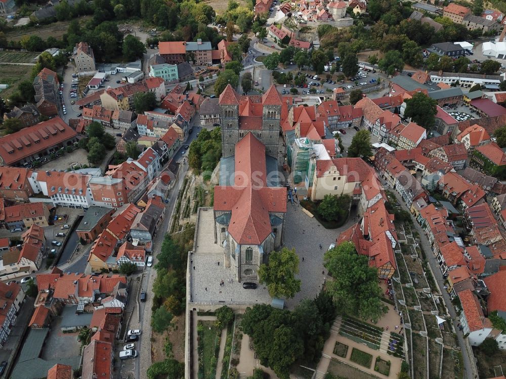 Quedlinburg from above - Collegiate Church St. Servatius and Castle Quedlinburg in Saxony-Anhalt. The place with its 1300 half-timbered houses as well as the castle with the historic church are part of the UNESCO world cultural heritage