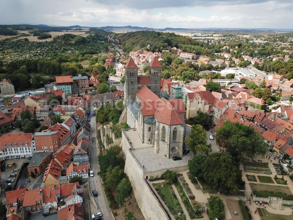 Aerial image Quedlinburg - Collegiate Church St. Servatius and Castle Quedlinburg in Saxony-Anhalt. The place with its 1300 half-timbered houses as well as the castle with the historic church are part of the UNESCO world cultural heritage