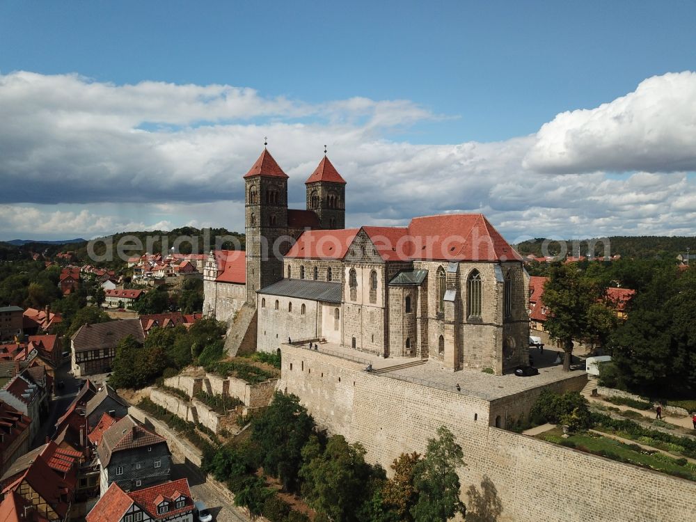 Quedlinburg from above - Collegiate Church St. Servatius and Castle Quedlinburg in Saxony-Anhalt. The place with its 1300 half-timbered houses as well as the castle with the historic church are part of the UNESCO world cultural heritage