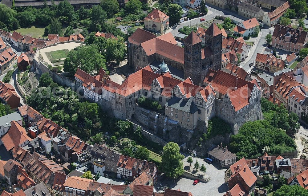 Quedlinburg from above - Collegiate Church St. Servatius and Castle Quedlinburg in Saxony-Anhalt. The place with half-timbered houses as well as the castle with the historic church are part of the UNESCO world cultural heritage