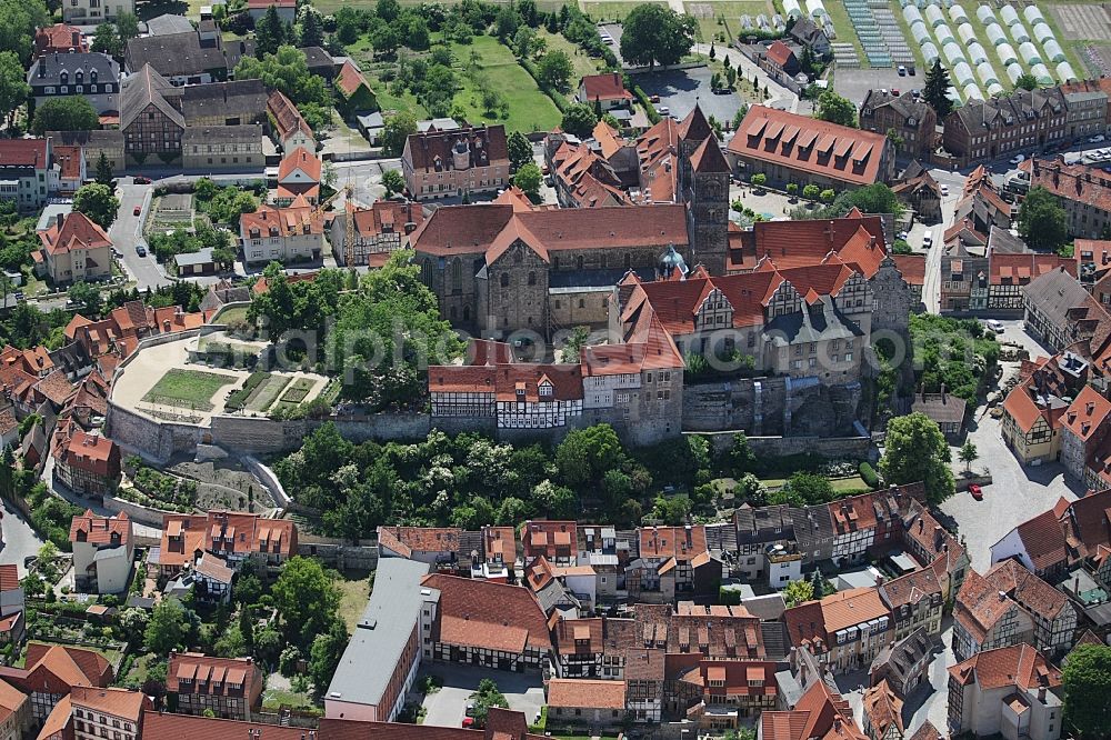 Quedlinburg from above - Collegiate Church St. Servatius and Castle Quedlinburg in Saxony-Anhalt. The place with half-timbered houses as well as the castle with the historic church are part of the UNESCO world cultural heritage