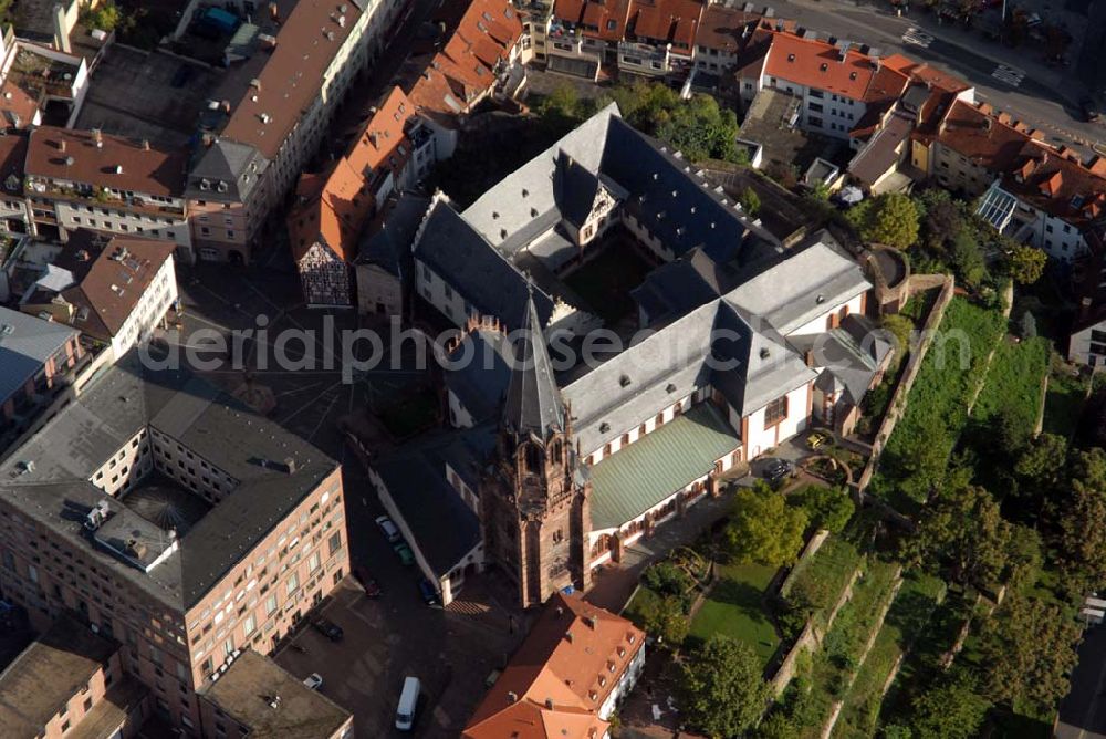 Aerial image Aschaffenburg - Blick auf die Stiftskirche St. Peter und Alexan der, die als einzige Kirche weltweit den Heiligen Petrus und Alexan der geweiht ist. Die Stiftsbasilika ist reich ausgestattet mit kunstgeschichtlich herausragenden Werken. Kontakt: Stiftspfarrei St. Peter und Alexan der, Stiftsgasse 5, 63739 Aschaffenburg