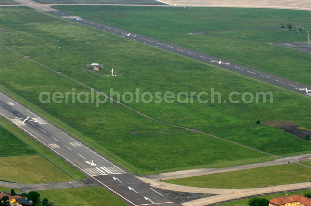 Aerial image Berlin - Blick auf den stillgelegten Flughafen Berlin - Tempelhof. Das Areal wird von der landeseigenen BIM Berliner Immobilienmanagement GmbH verwaltet. View of the disused airport Berlin - Tempelhof.