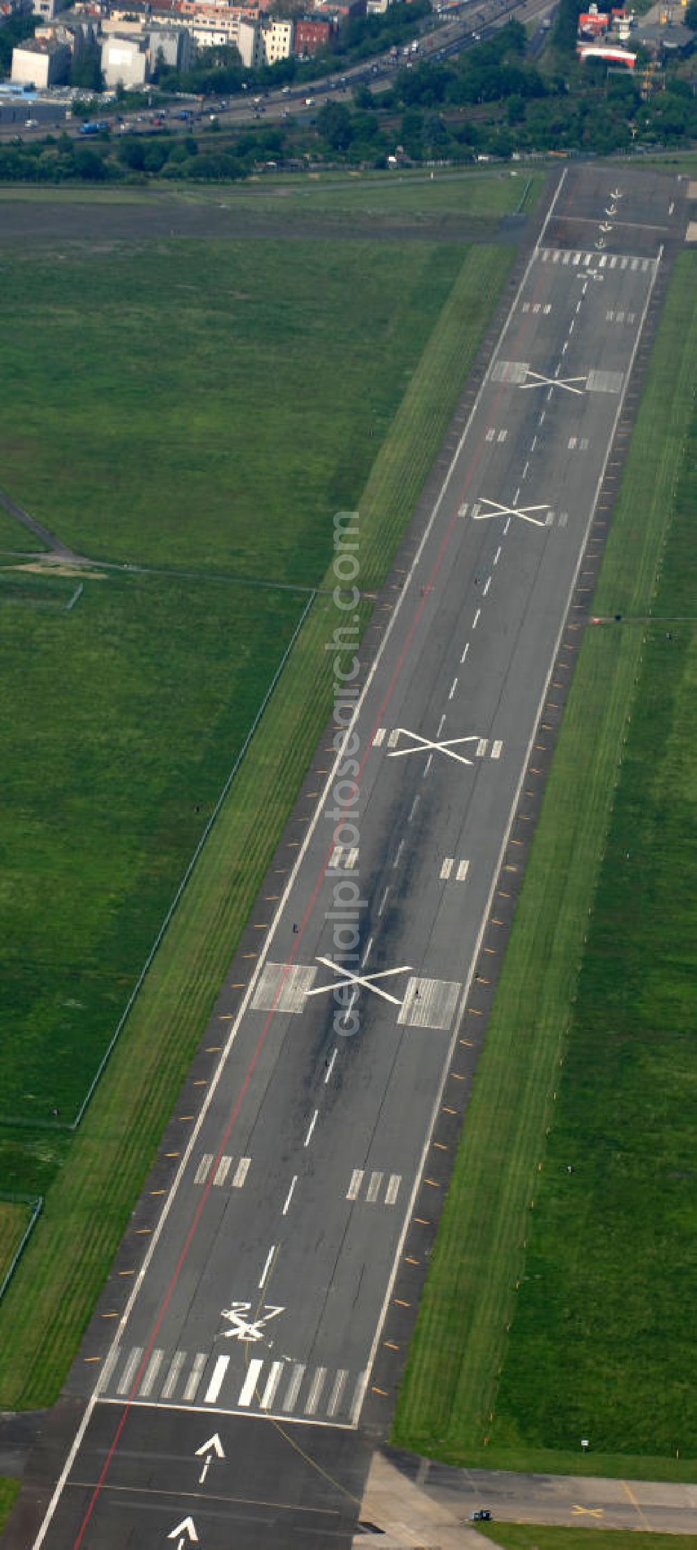 Aerial image Berlin - Blick auf den stillgelegten Flughafen Berlin - Tempelhof. Das Areal wird von der landeseigenen BIM Berliner Immobilienmanagement GmbH verwaltet. View of the disused airport Berlin - Tempelhof.