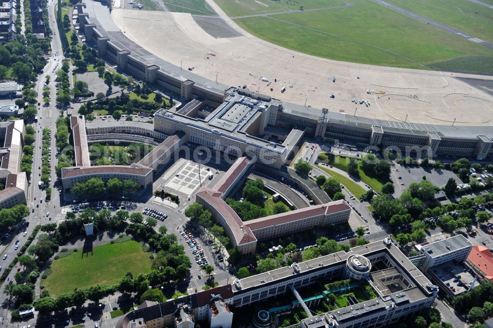 Berlin Tempelhof from the bird's eye view: Blick auf den stillgelegten Flughafen Berlin - Tempelhof. Das Areal am Tempelhofer Flugfeld wird von der landeseigenen BIM Berliner Immobilienmanagement GmbH verwaltet. View of the disused airport Berlin - Tempelhof.